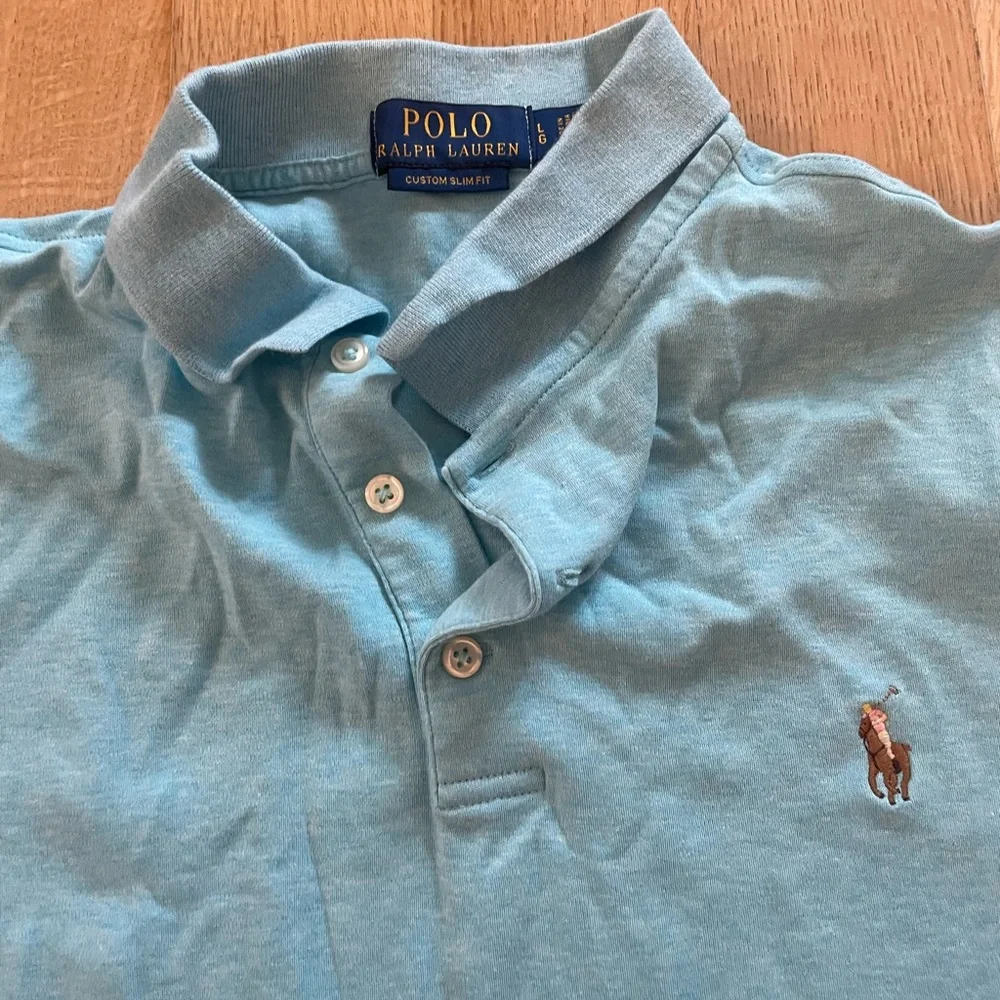 Ralph Lauren Light Blue Polo Shirt with Multi Color Pony Logo